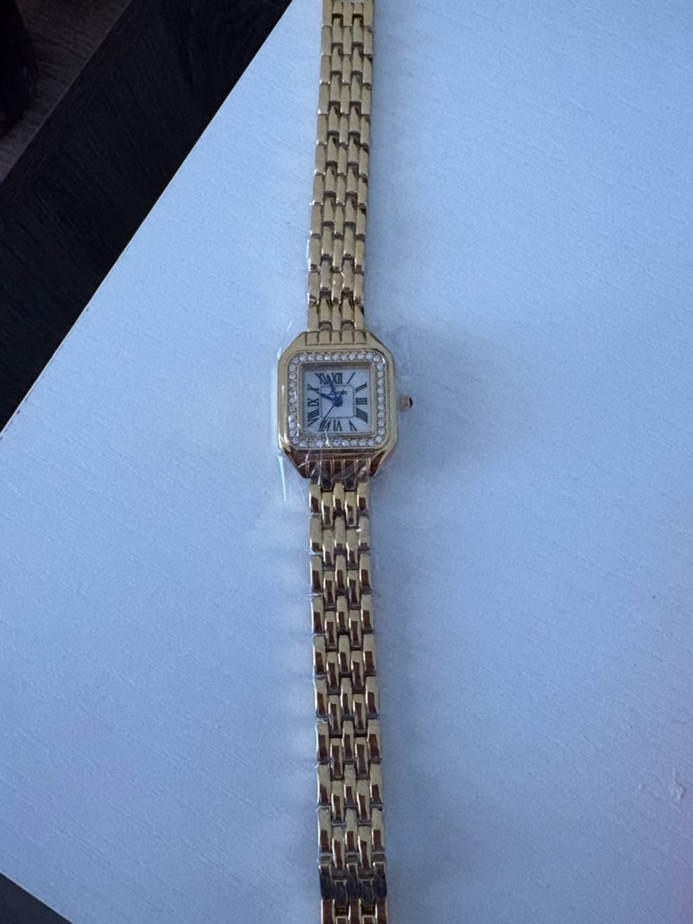 Gold tone watch